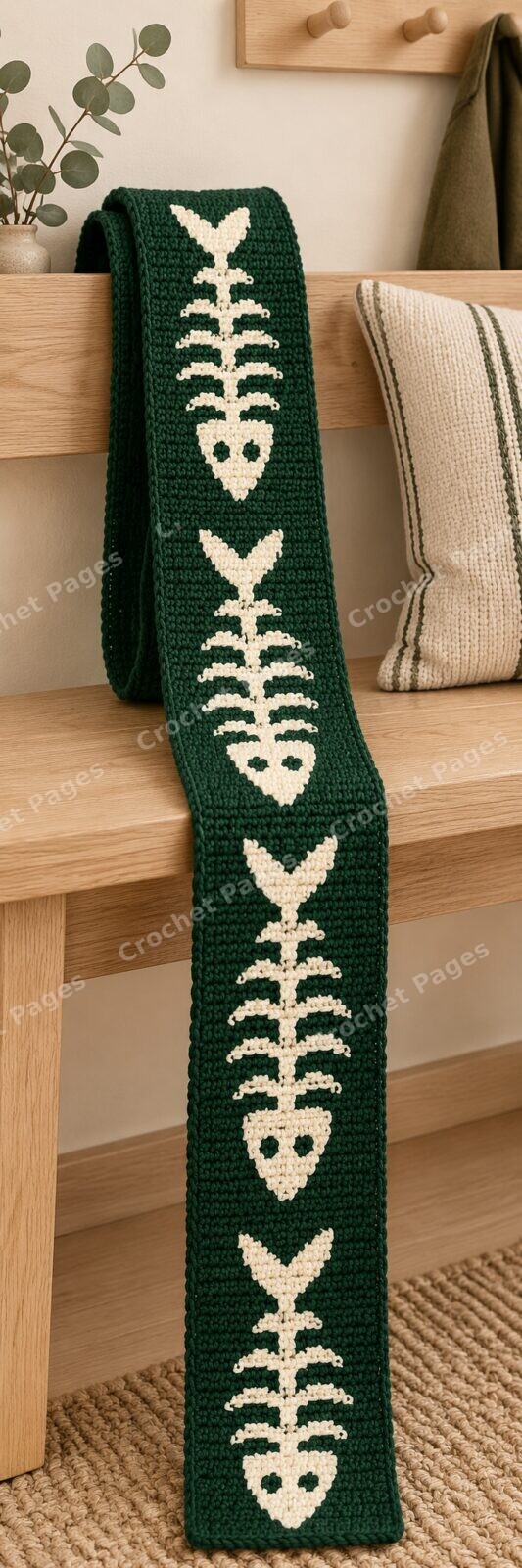 Angled detail mockup of Forest Fishbone Scarf, showing the recognizable motifs and crochet yarn texture.