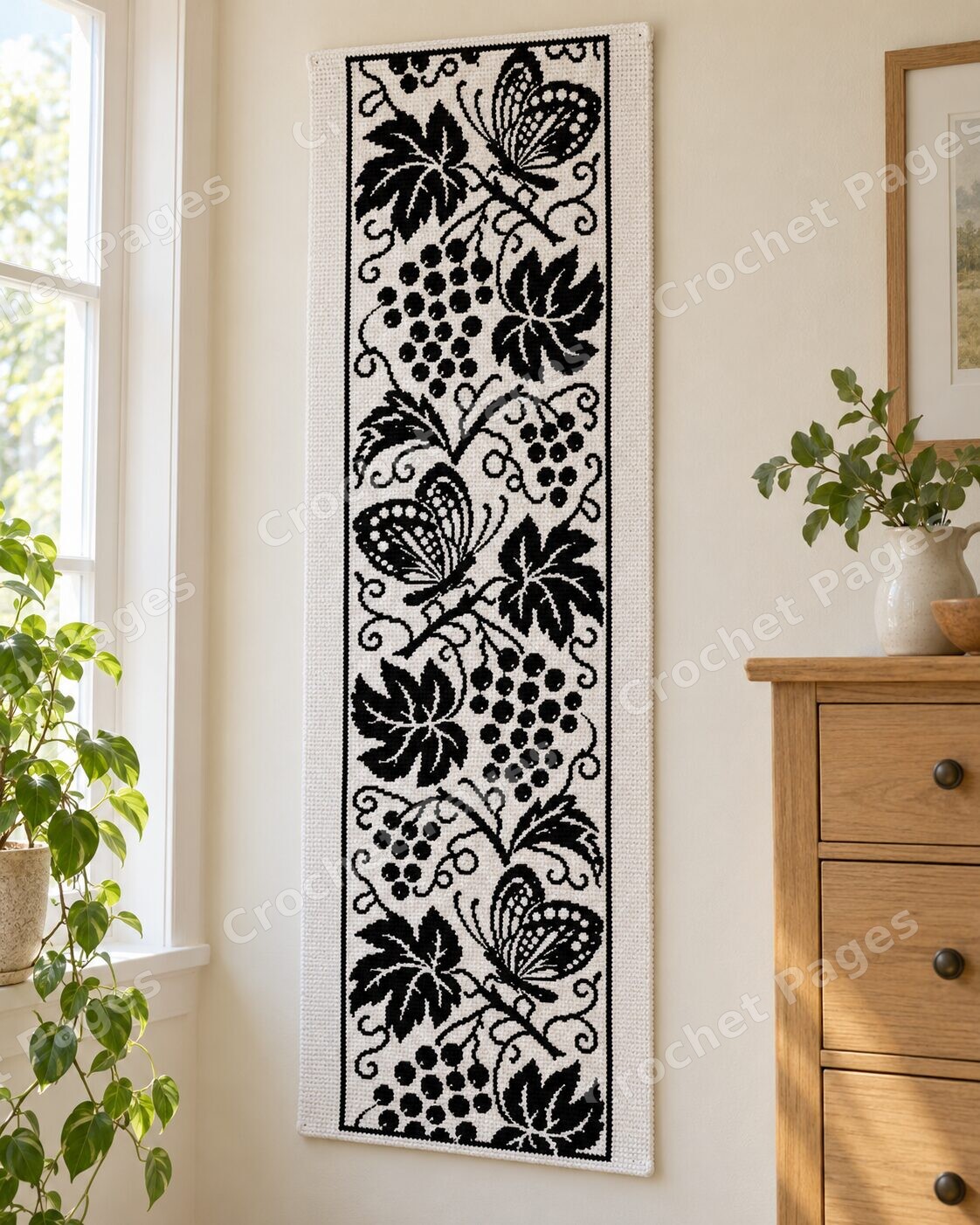 Butterflies Grapevine Panel crochet wall hanging mockup, showing the full colorwork design in a cozy room.