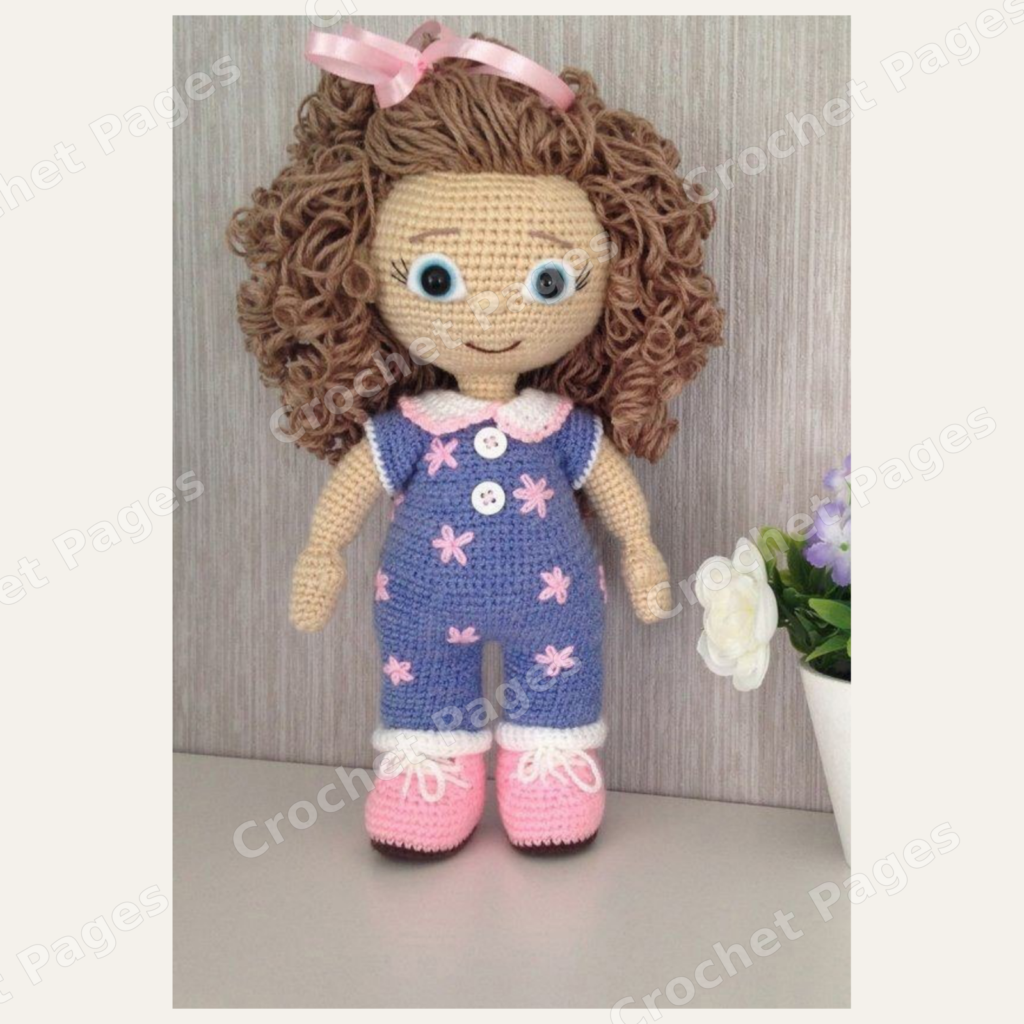 Doll in Overalls finished crochet project shown in the actual pattern photographs