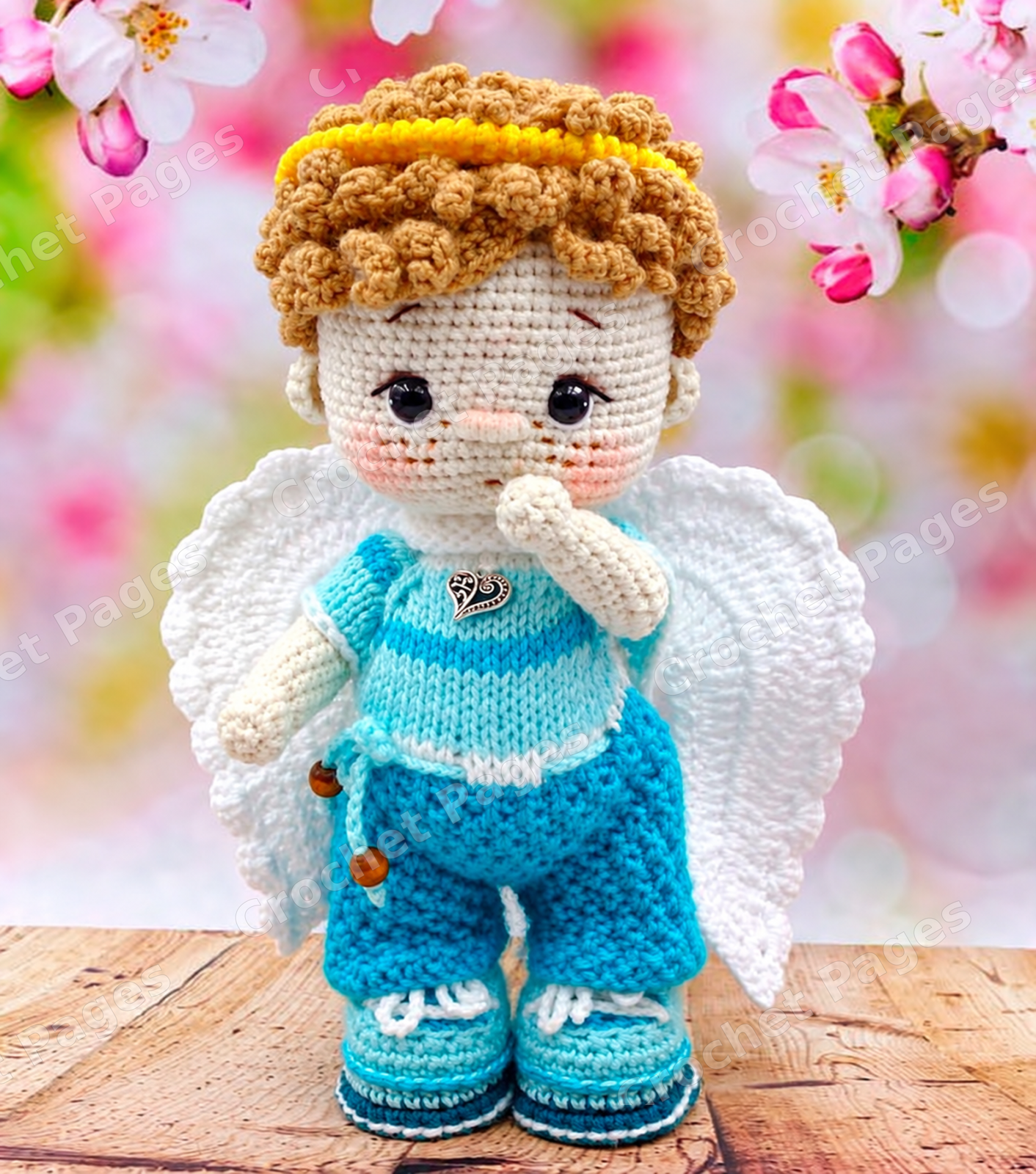 Make a jointed angel doll with sculpted cheeks, embroidered features, a curled hair cap, laced shoes, removable wings and a tied halo.
