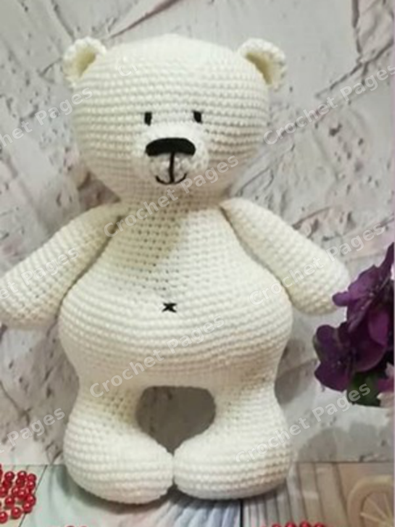 Crochet a classic teddy bear with rounded ears, shaped feet, a contrasting muzzle and a small tail. Clothing instructions are not included. Finished-project view.