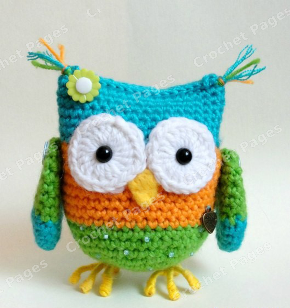 Crochet a colorful owl with large white eye circles, two-tone wings, looped yarn toes and corner tassels. Includes photos for the top closure, feet and tassels. Finished-project view.