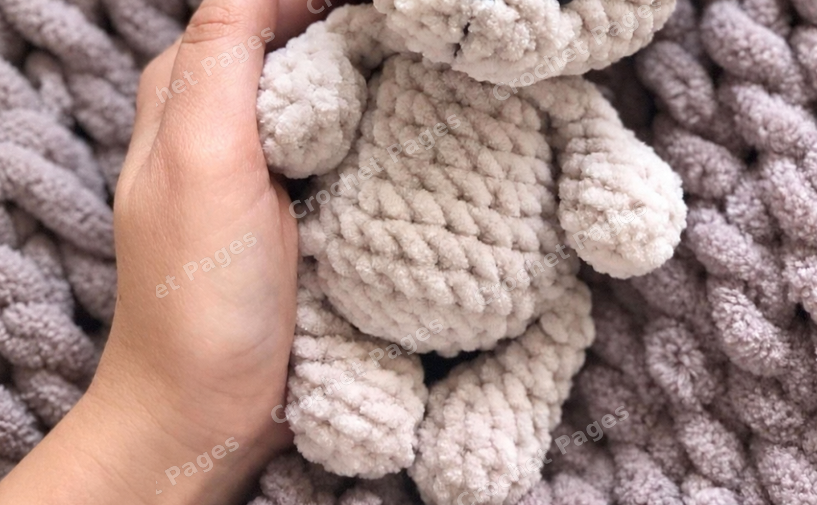 Crochet a little bear with rounded ears, a textured contrasting muzzle and short limbs.